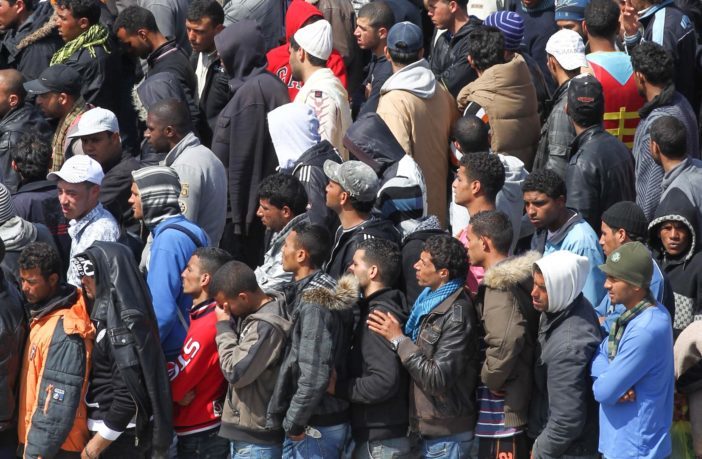Click to enlarge Migrants arrive in Italy