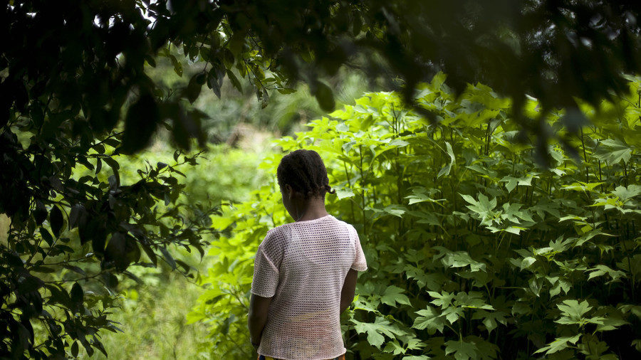Click to enlarge child in woods