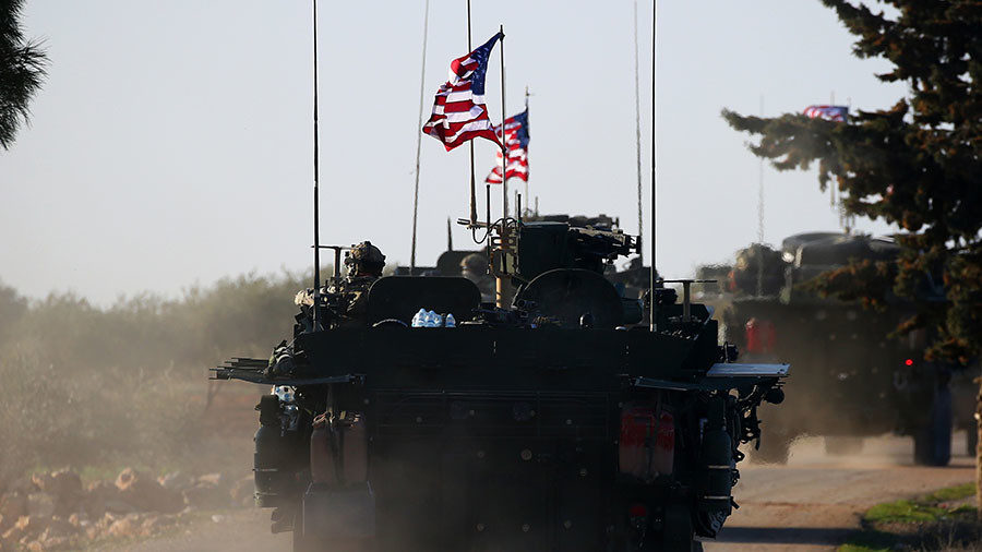 Click to enlarge US soldiers in combat vehicles