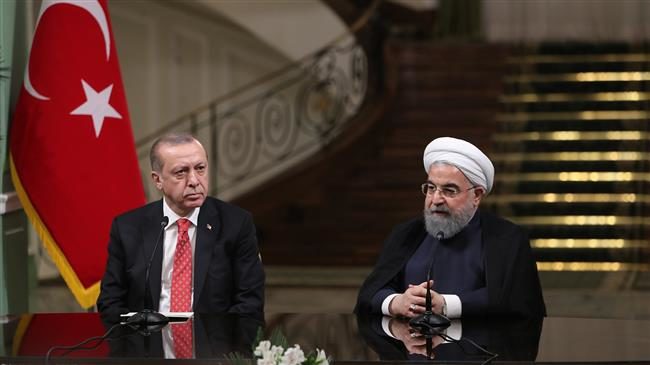 Iranian President Hassan Rouhani (R) and his Turkish counterpart Recep Tayyip Erdogan