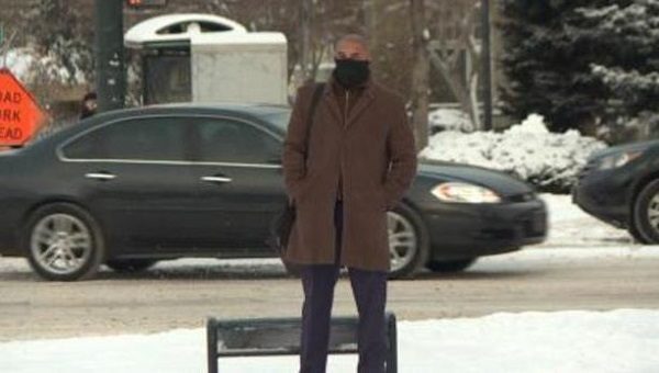 man standing in cold