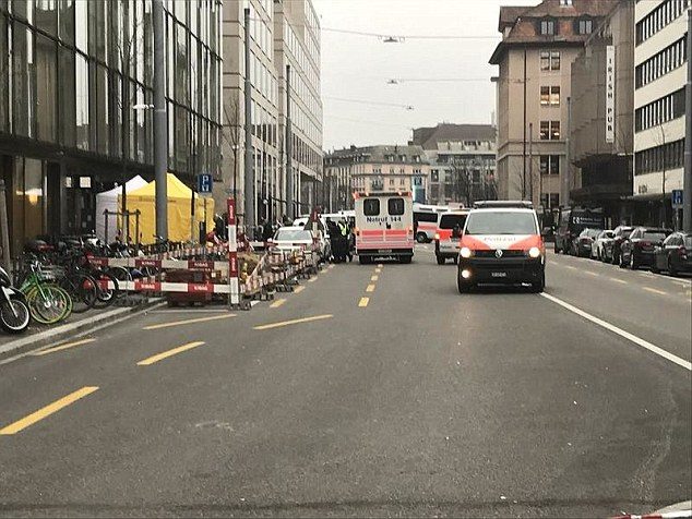 There was a large police presence in the Swiss financial capital after two people were reportedly shot dead