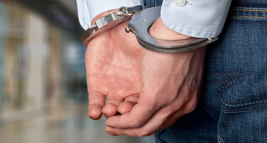 handcuffed man
