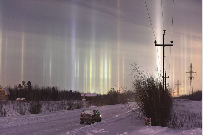 Spectacular light pillars illuminate St. Petersburg skies (PHOTOS)