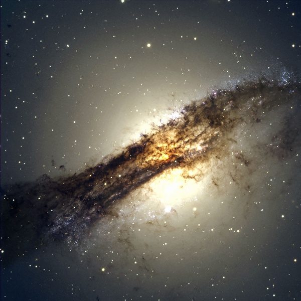 Centaurus A (NGC 5128) is an active galaxy that likely resulted from the recent merger of an elliptical with a spiral. Astronomers have now shown that 14 of 16 surveyed satellite galaxies rotate around the parent galaxy coherently in a plane.