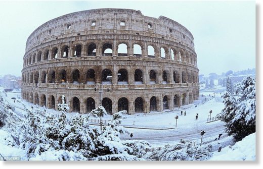 Click to enlarge A rare snow storm in Rome on Monday disrupted transport, shut down schools and prompted authorities to call in the army to help clear the streets. Pictured, the Colosseum