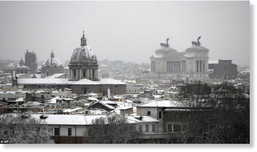 Click to enlarge A view of Rome's snow-capped skyline, with the Monument of the Unknown Soldier seen at right, after snowfall on Monday