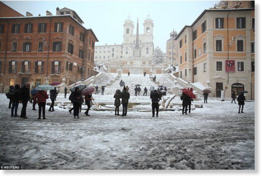 The residents of Rome are seen in front of the Spanish Steps to enjoy the unusual weather in the Italian capital