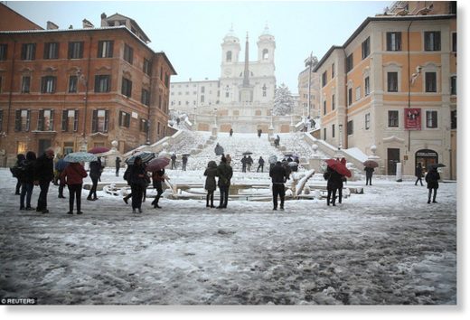 Click to enlarge The residents of Rome are seen in front of the Spanish Steps to enjoy the unusual weather in the Italian capital