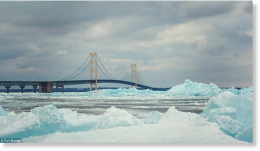 Click to enlarge Photographers have flocked to The Great Lake State's shoreline to capture the irregular rectangles towering with the iconic Mackinac Bridge in the background