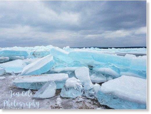 Click to enlarge Blue ice occurs when snow falls on a glacier, is compressed, and becomes part of the glacier. Air bubbles are squeezed out and ice crystals enlarge, preventing the passage of light and making the ice appear blue