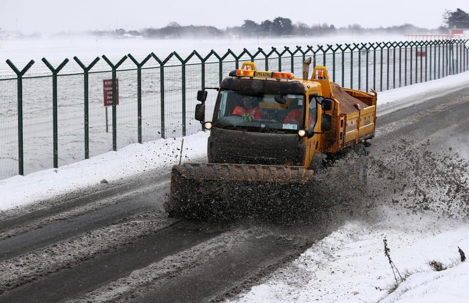 A snow plough clears a road at Dublin Airport