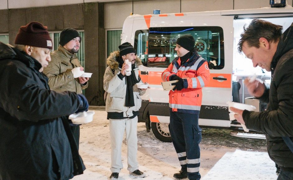 Click to enlarge Volunteers of the German Johanniter Order aid organization distributed meals to people in need and homeless people in Hanover as part of their winter bus operation earlier this week.