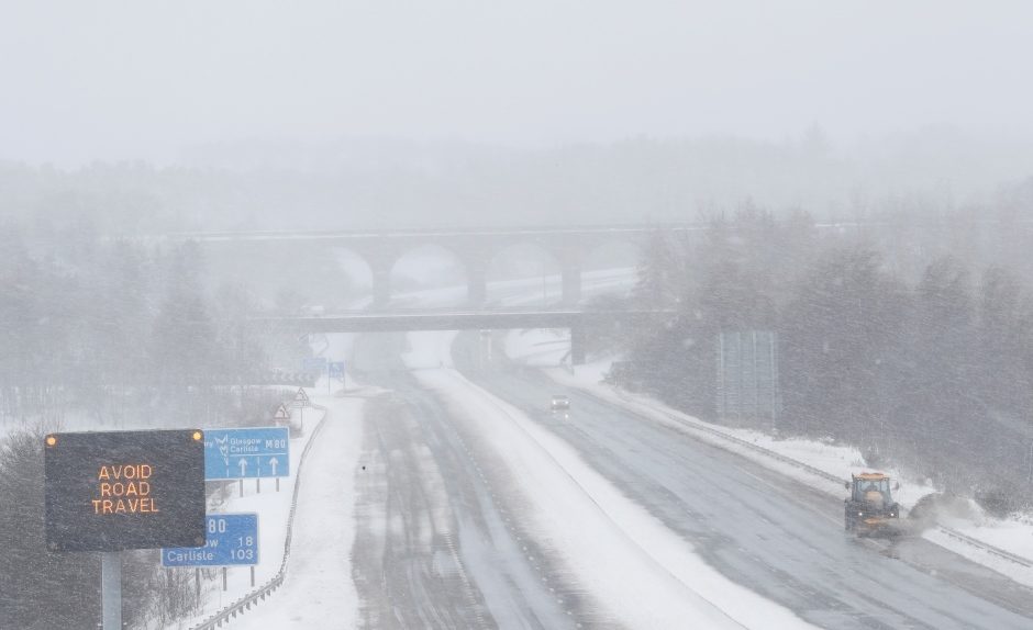 Click to enlarge Drivers were being urged to stay off the road Thursday as snowplows cleared the way along the M80 motorway, near Castlecary, Scotland.