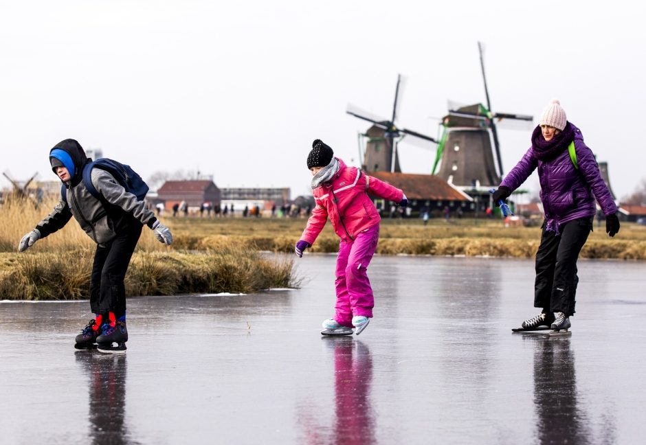 Skaters enjoyed the natural ice at the Dutch 'Zaanse Schans' near Zaandam on Thursday.