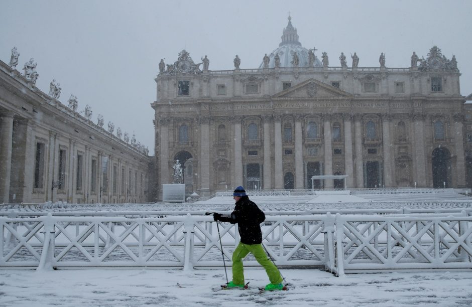 Click to enlarge This man found an interesting way to get around during a heavy snowfall in Saint Peter's Square at the Vatican on Monday.