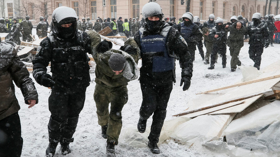 Riot police detain protesters in Kiev