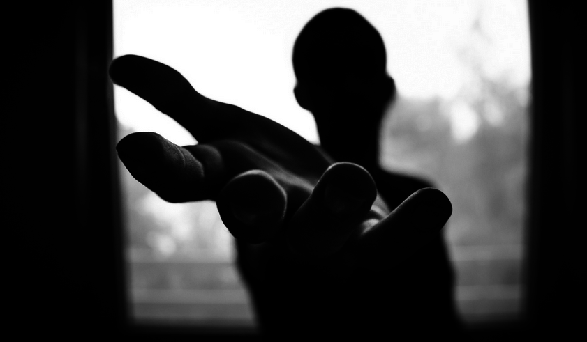 Click to enlarge person reaching hand out