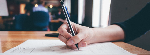 Click to enlarge woman writing
