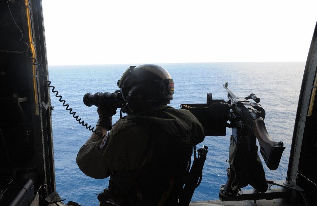 Canadian Navy sailor on helicopter
