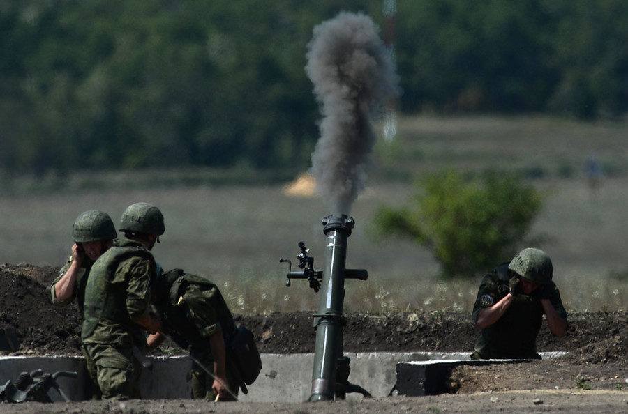 2S12 'Sani' mortar in action.