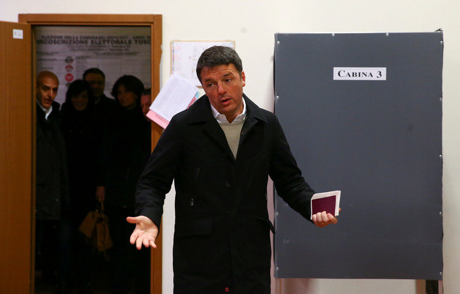 Click to enlarge Democratic Party leader Matteo Renzi casts his vote at a polling station in Florence