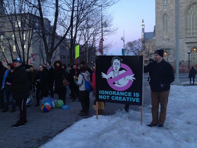 Protesters gather outside the National Gallery of Canada in Ottawa