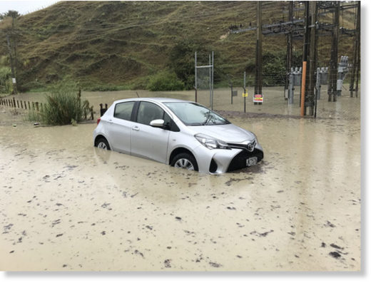 Click to enlarge Hawke's Bay Today photographer's car caught in flooding in Eskdale area, near Napier. He only left it for 15 minutes!