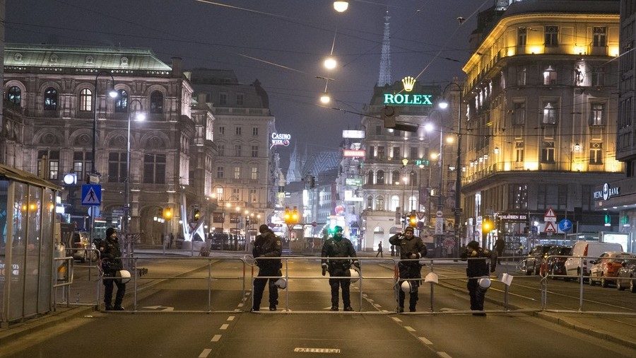 Police officers block a street in the Austrian capital of Vienna.