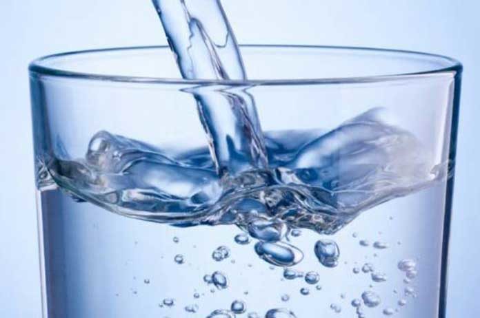Click to enlarge tall glass of water