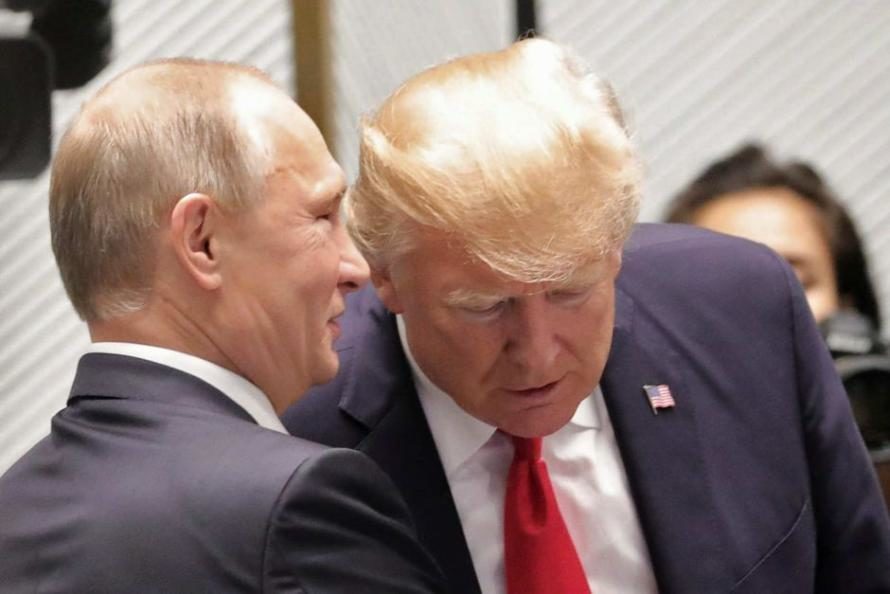 trump putin whisper