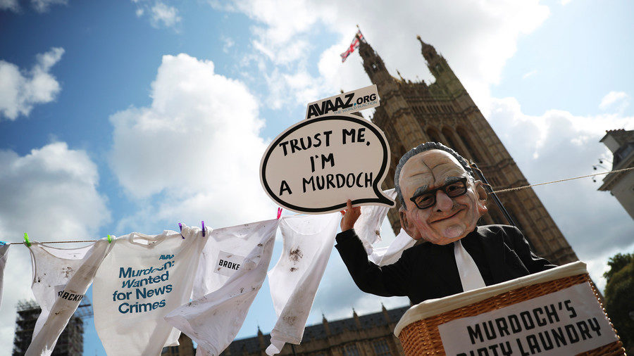 Click to enlarge Rupert Murdoch cartoon float