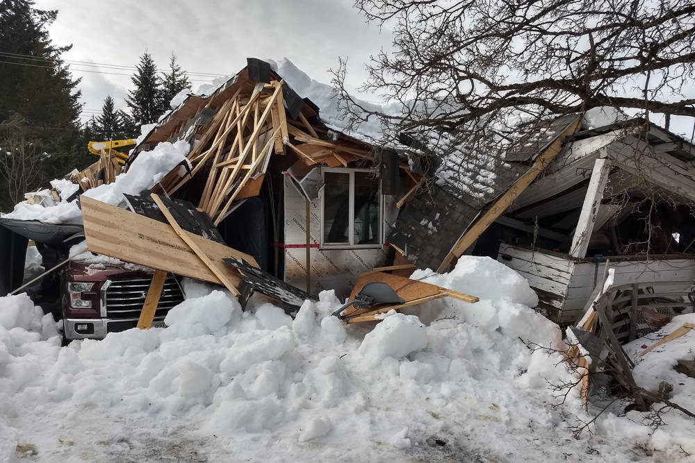 Click to enlarge A Nakusp woman escaped unharmed after the house collapsed around her.