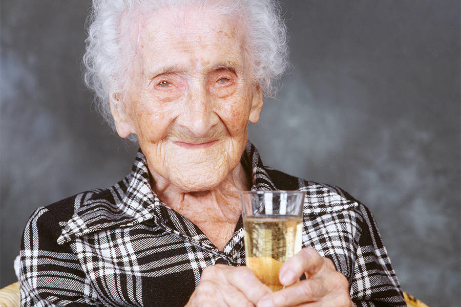 Click to enlarge Jeanne Calmert on her 120th birthday.
