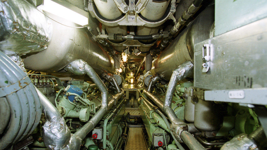 A narrow corridor of a nuclear-powered submarine