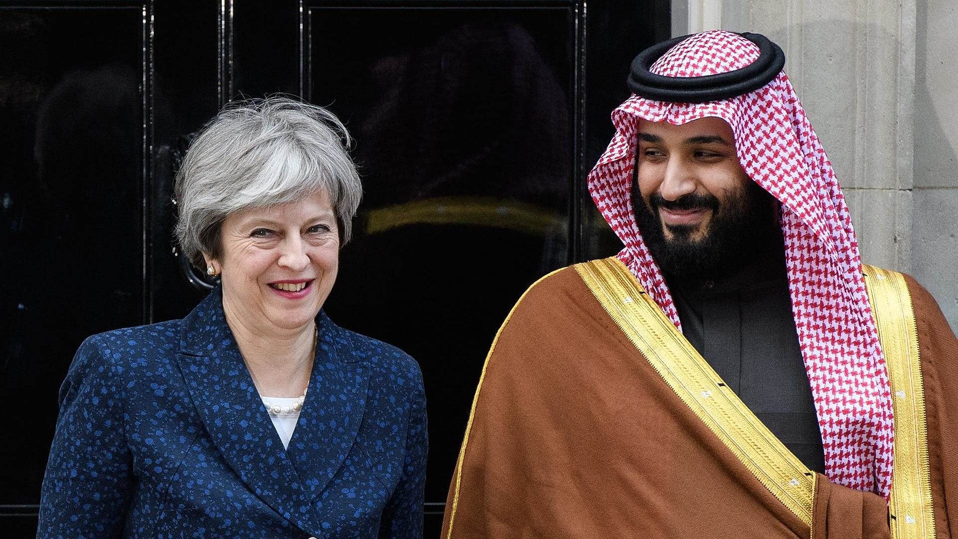 Saudi Crown Prince Mohammed bin Salman stands with British prime minister Theresa May