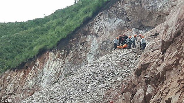 Click to enlarge Santusa's remains later found buried under earth and stones by National Police and firemen