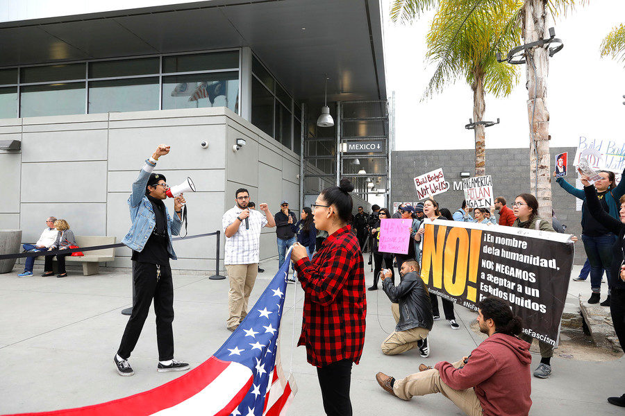 Click to enlarge Protest Trump tour border wall San Diego