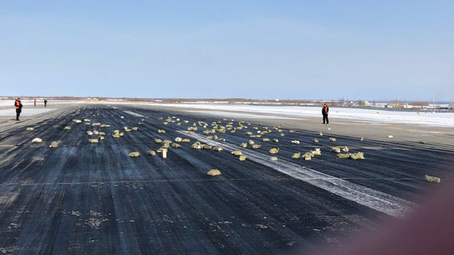 Gold bars on airport runway