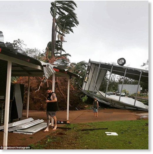 A tin roof was ripped off by the cyclone and even tipped one tin shed upside down