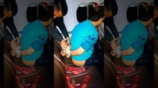 naked man on plane