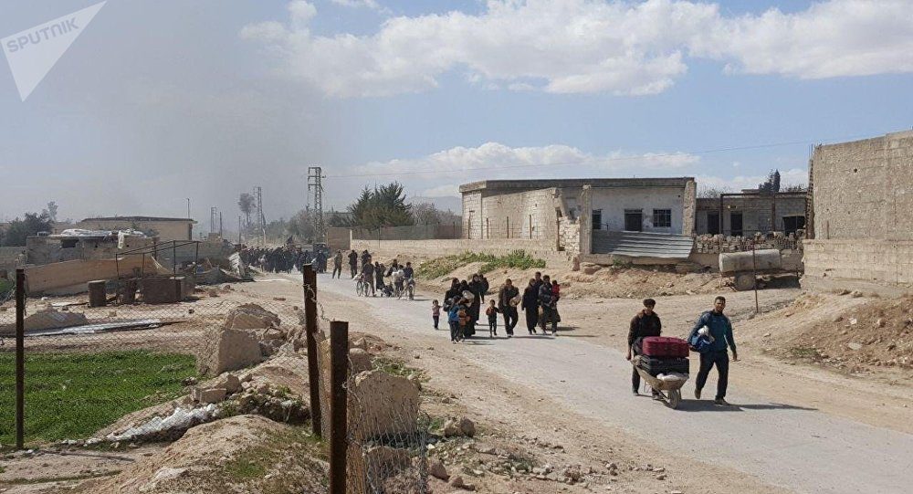 Click to enlarge Residents leave Eastern Ghouta