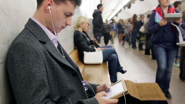 man with headphones tablet