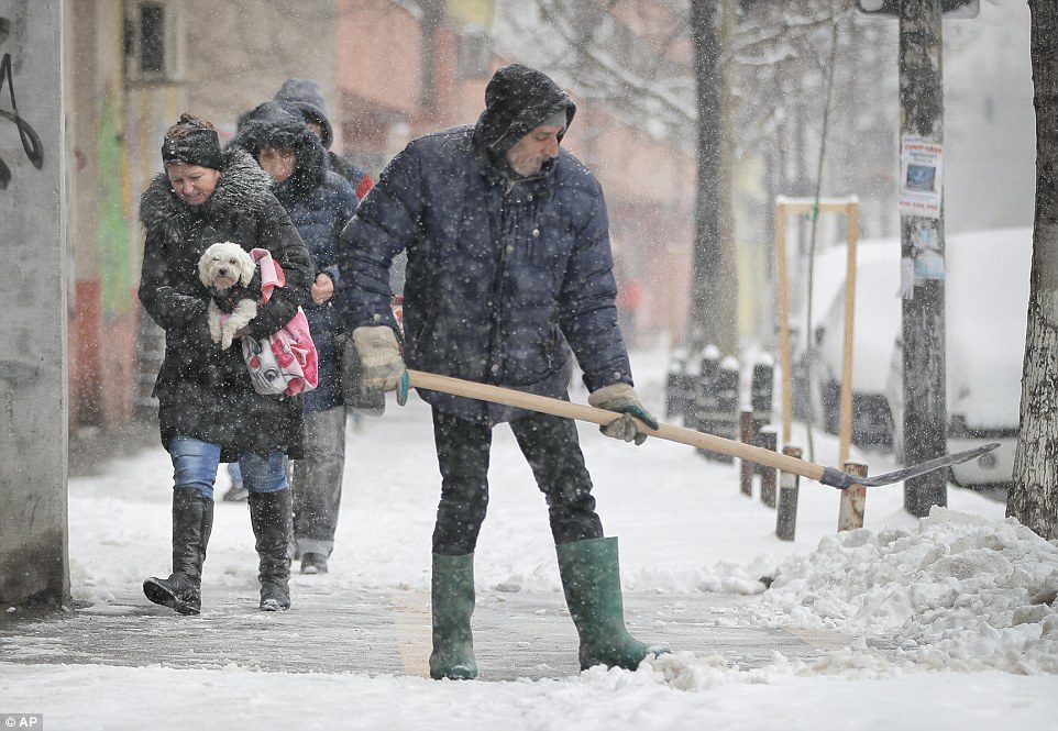 Click to enlarge The Romanian capital of Bucharest was left under a covering of snow and ice, and thirty flights were delayed due to the cold conditions