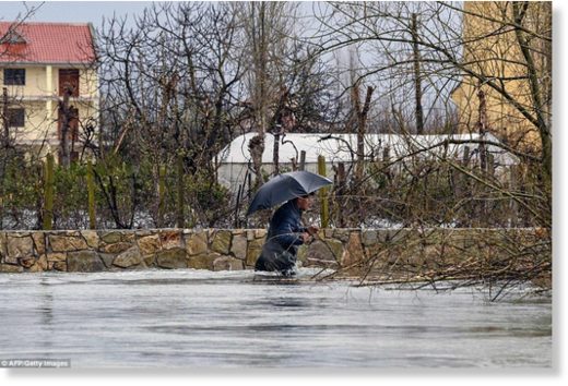 Click to enlarge Around 800 people in the Albania village of Obot were left cut off from the rest of the country thanks to flooding that was also caused by melting snow