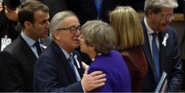 EU Commission President Jean-Claude Juncker (2nd L) welcomes British Prime Minister Theresa May (R)