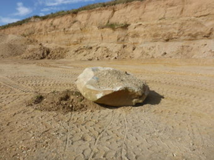 This boulder in the gravel pit Rehbach in Saxony, Germany, was transported from Scandinavia by glaciers 450,000 years ago.