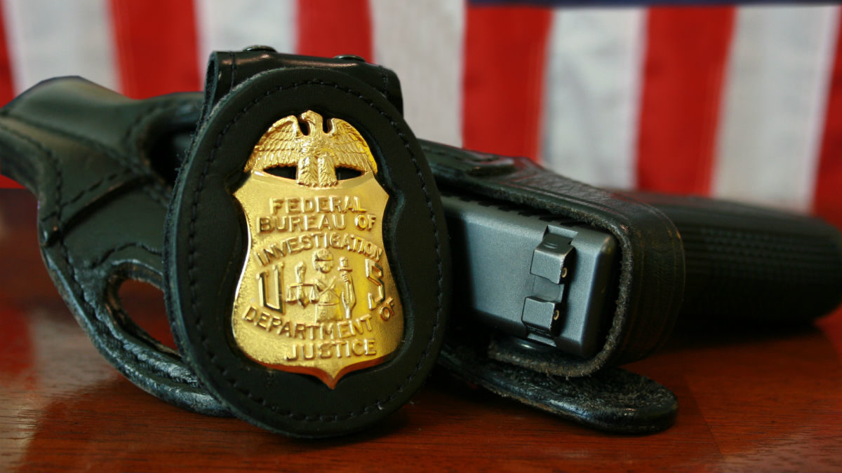 Click to enlarge FBI badge gun