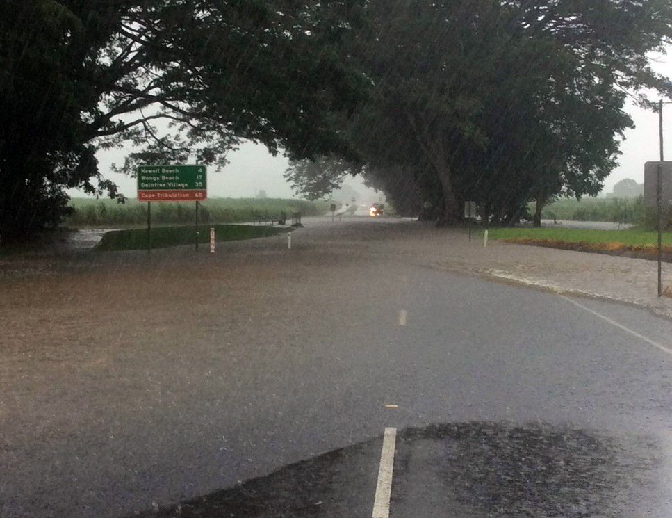 Flooded road in northern Queensland, Australia, after torrential rain from ex Tropical Cyclone Nora, March 2018.