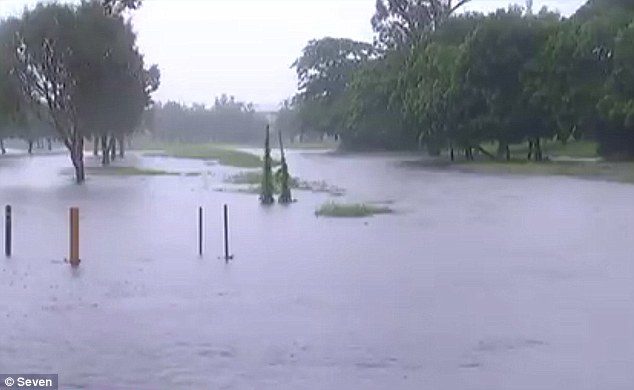 Click to enlarge Flood warnings were issued for the Cairns area as heavy rains lash north Queensland